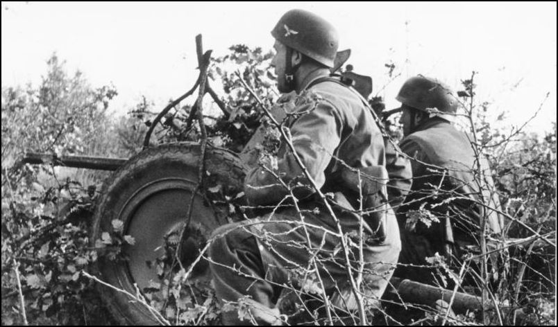 German paratroopers fire at Allied troops during the February, 1944 counterattack.. German Federal Archive.