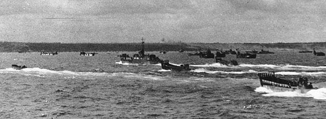 Landing craft approach Normandy Beach. National Archives.